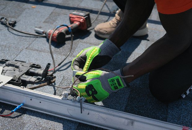 Solar installation work on a roof